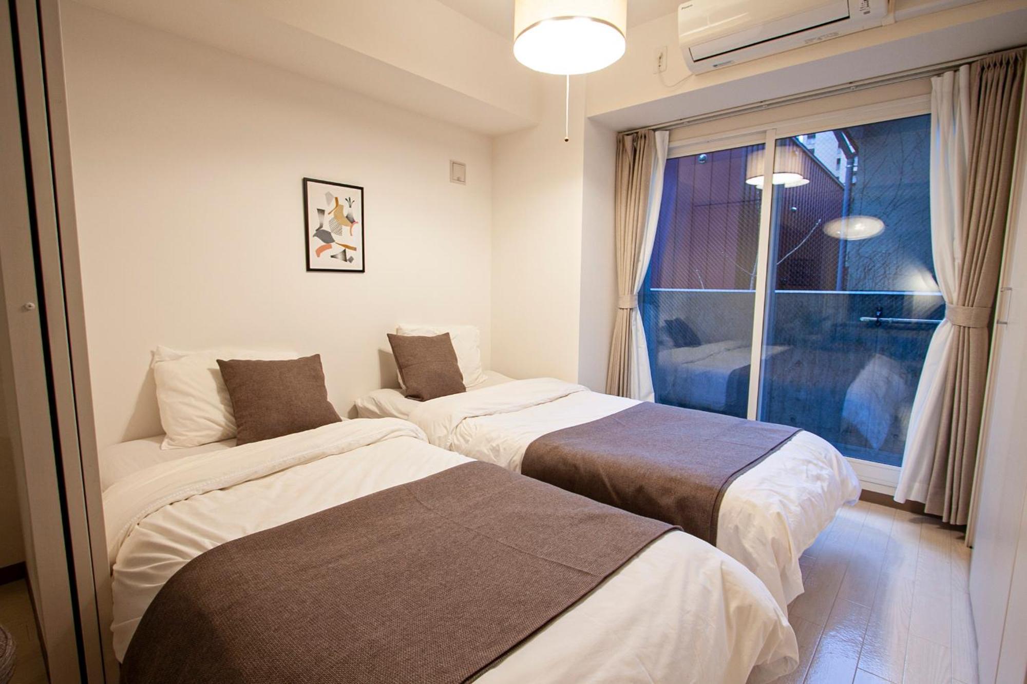 Ferienwohnung Tsubaki Garden Sapporo Zimmer foto