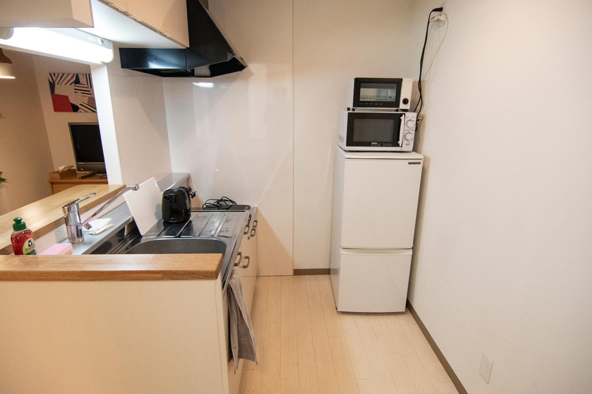 Ferienwohnung Tsubaki Garden Sapporo Zimmer foto