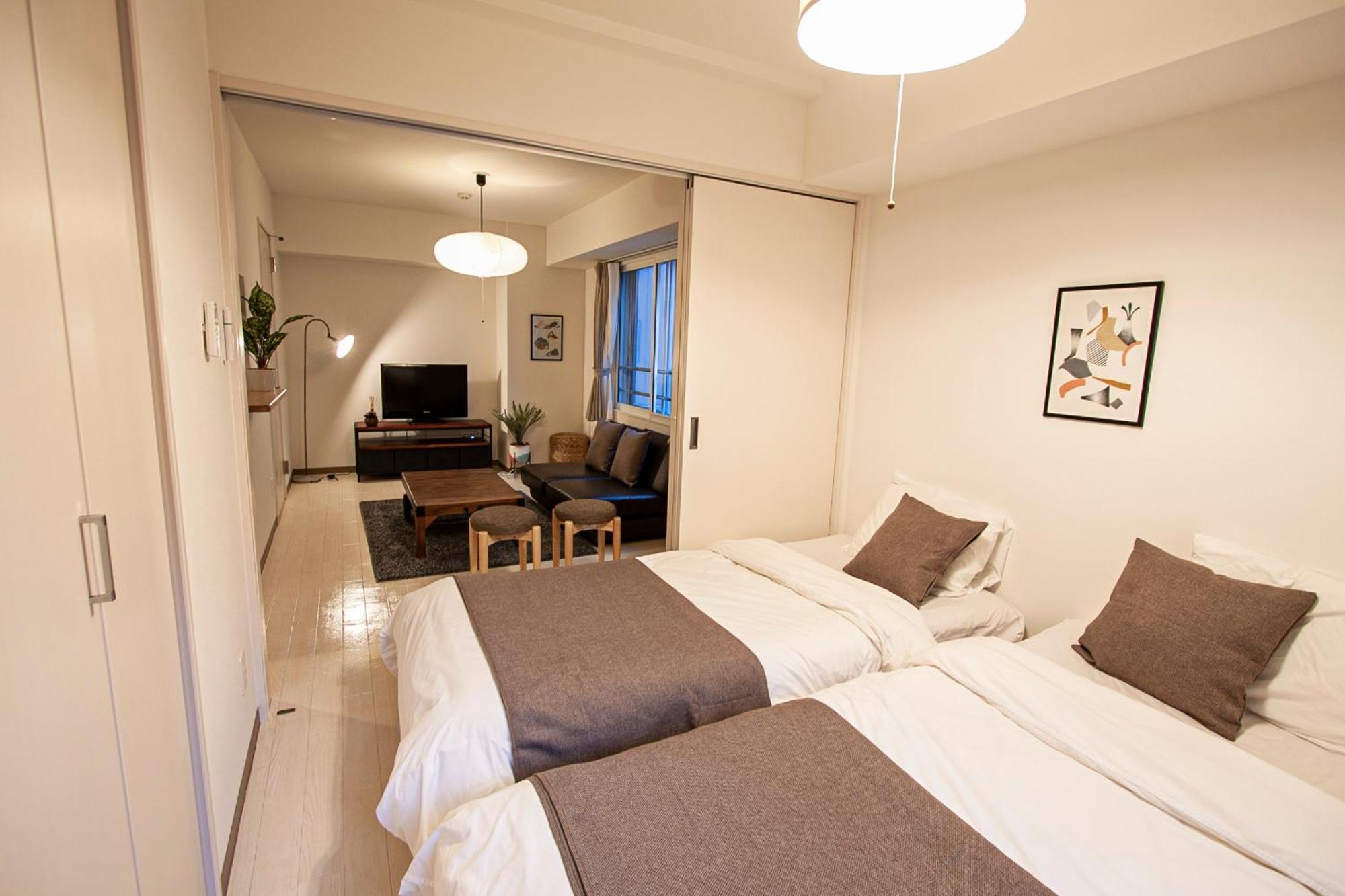 Ferienwohnung Tsubaki Garden Sapporo Zimmer foto