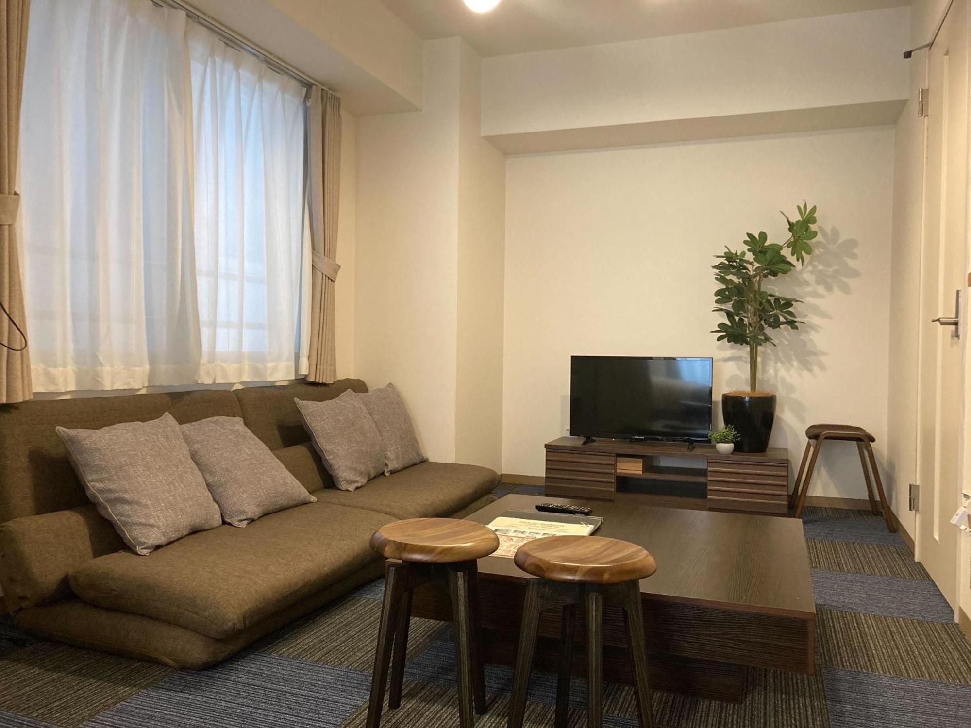 Ferienwohnung Tsubaki Garden Sapporo Zimmer foto