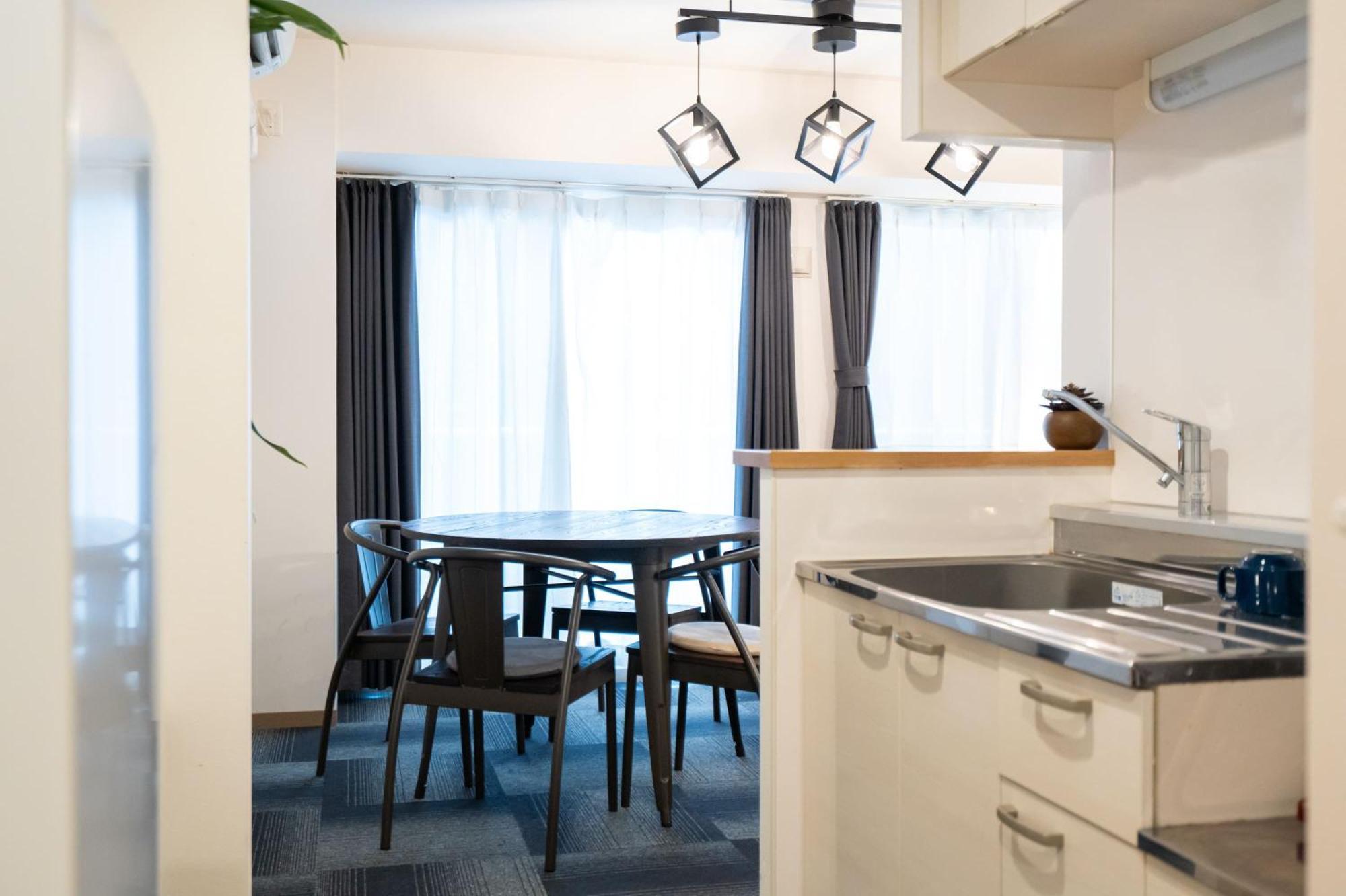 Ferienwohnung Tsubaki Garden Sapporo Zimmer foto