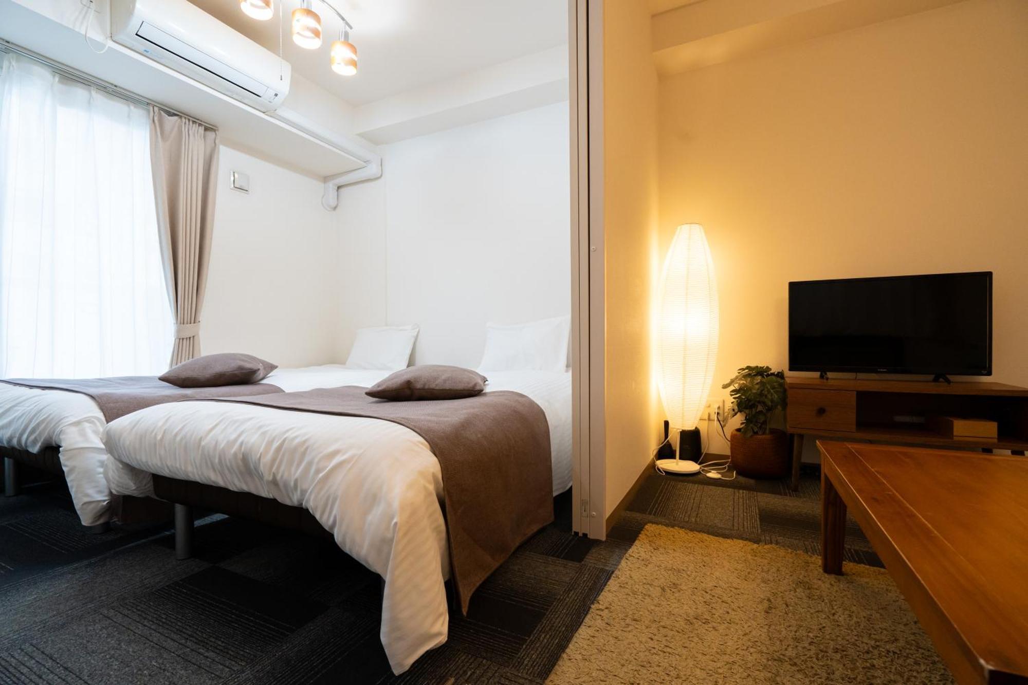 Ferienwohnung Tsubaki Garden Sapporo Zimmer foto