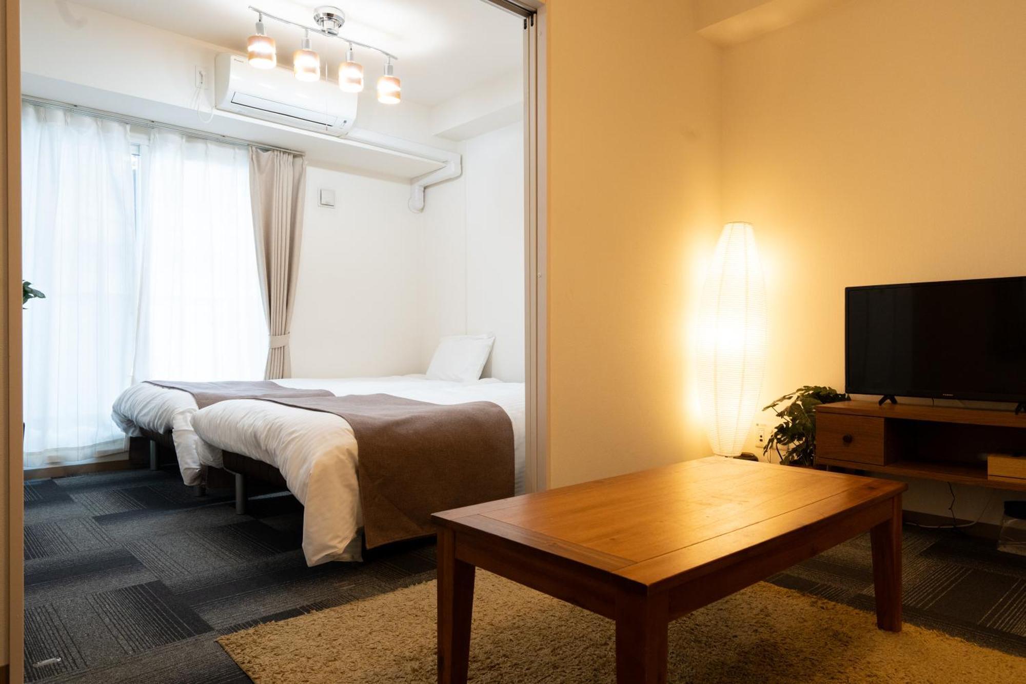 Ferienwohnung Tsubaki Garden Sapporo Zimmer foto